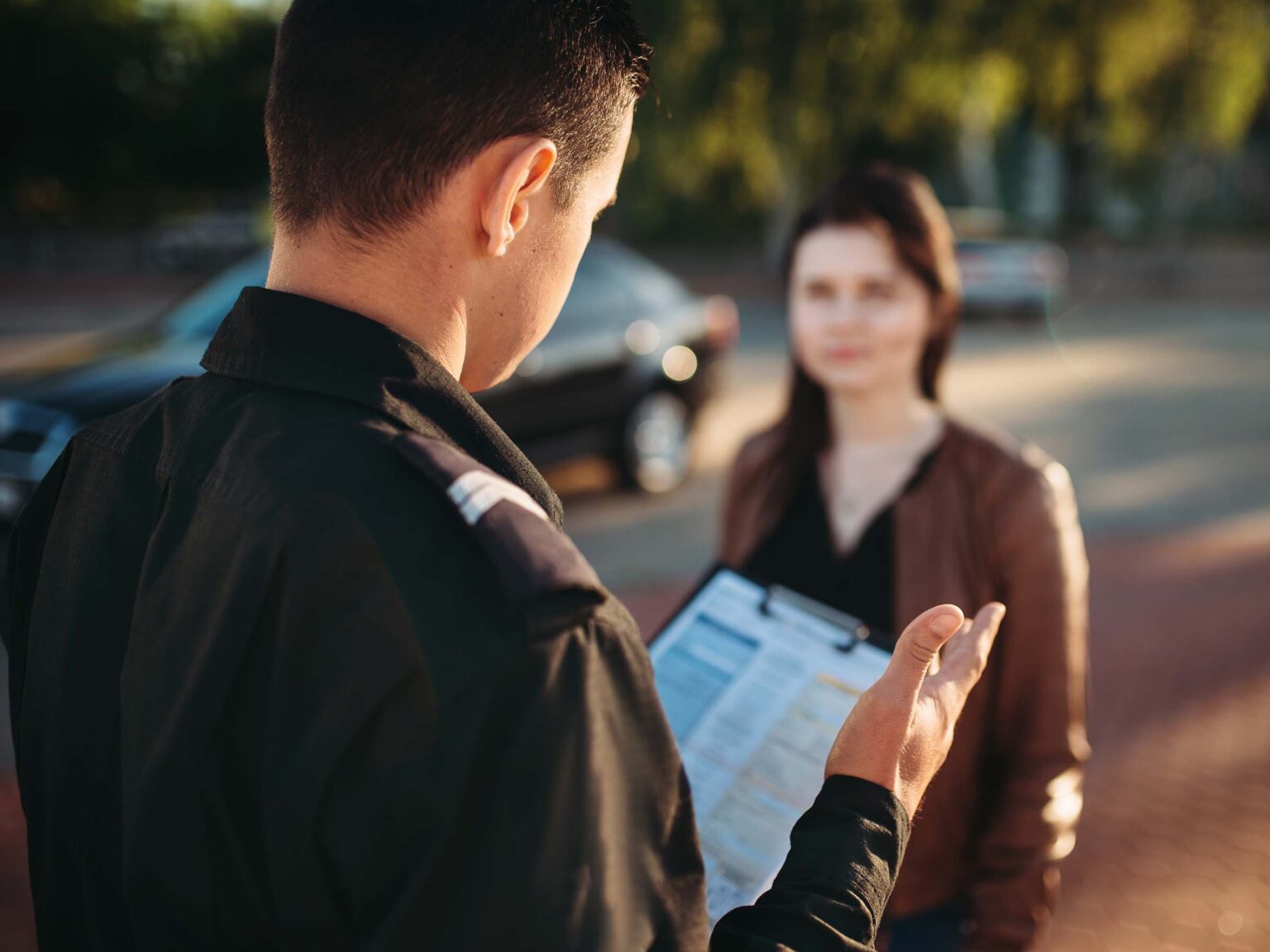 police-officers-reads-law-to-female-driver-JZKG5ML.jpg